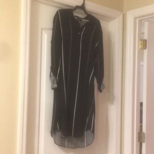 A black and white striped dress with long sleeves